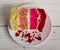 Multicolor cake on the plate for Valentine Day