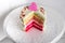 Multicolor cake for Valentine Day on white background