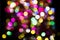 Multicolor colorful blurred festive bokeh circles.