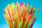 Multicolor flexible straws in the glass closeup