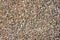 Multicolor gravel stone background close up