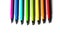 Multicolor pens on white background