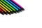 Multicolor pens on white background