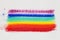 Multicolor rainbow brush strokes on artist canvas
