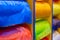 Multicolor rolls of polyethylene film in stock. Modern warehouse and storage systems