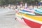 Multicolor rowboat or sea kayaks on beach with copy space.