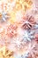 Multicolor snowflakes on candy pastel background