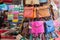 Multicolored bags and wallets on the market