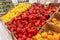 Multicolored bell peppers on the counter in the supermarket