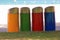 Multicolored bins on the beach