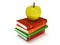 Multicolored book tower with yellow apple