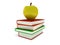 Multicolored book tower with yellow apple