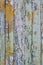 Multicolored bright old planks with cracked paint