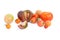 Multicolored, bright tomatoes on a white background, isolated.