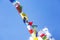 Multicolored Buddhist flags on blue sky