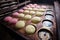 Multicolored buns for burgers on a baking tray