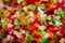 Multicolored candied fruit on full frame close-up. Tutti-Frutti, served in a bowl, selective focus.