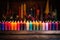 multicolored candles on a wooden altar