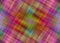 Multicolored checkered and striped napkin pattern as abstract background