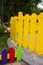 Multicolored children`s fence, outdoors