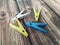 Multicolored clothespins on a wooden table