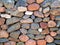 Multicolored cobblestones stone wall, good for background, seamless line