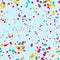 Multicolored Confetti or Round Shape Inkblots Randomly Scattered in Endless Infinite Pattern against Blue Backdrop