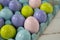Multicolored Easter eggs in the carton