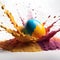 Multicolored egg fall into a pile of paint.