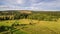 Multicolored European Countryside summer Landscape With Green Field