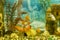 Multicolored fish in the aquarium. Goldfish in freshwater aquarium with green beautiful planted tropical. fish in freshwater