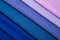 Multicolored folds of blue, lilac and pink fabric