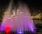 Multicolored fountain with the holidays decorations city life