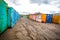 Multicolored garages in the industrial area witn asphalt road