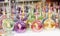 Multicolored glass vintage oriental bottles for perfume or aromatic oils