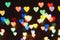 Multicolored hearts on a black background