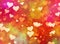 Multicolored hearts bokeh background