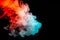 Multicolored illuminated smoke rolling from blue to red along substance molecules swirls on a dark background, depicting a