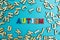 Multicolored inscription `autism` on a blue background, scattered letters