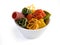 Multicolored italian pasta in bowl