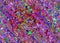 Multicolored kaleidoscope abstract chaos liquid spotted pattern. Comic background