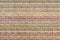 Multicolored knitted fabric background texture. Ð¡olorful fabric with a pattern, Fragment colored wool carpet, bright wicker