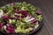 Multicolored leafy vegetable mix in black plate