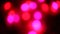 Multicolored lights beautiful glittering bokeh in dark blurry background at night, round colorful shine and go out from. Red, blue