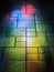 Multicolored lights reflected on stone tile floor