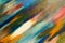 Multicolored long diagonal watercolor strokes on the canvas