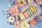 Multicolored macaroons cakes with big and small different flower