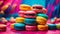 Multicolored macaroons are stacked on top of each other