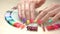 Multicolored manicure and nail polish samples.