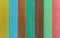 Multicolored modern wooden background. The boards are arranged vertically